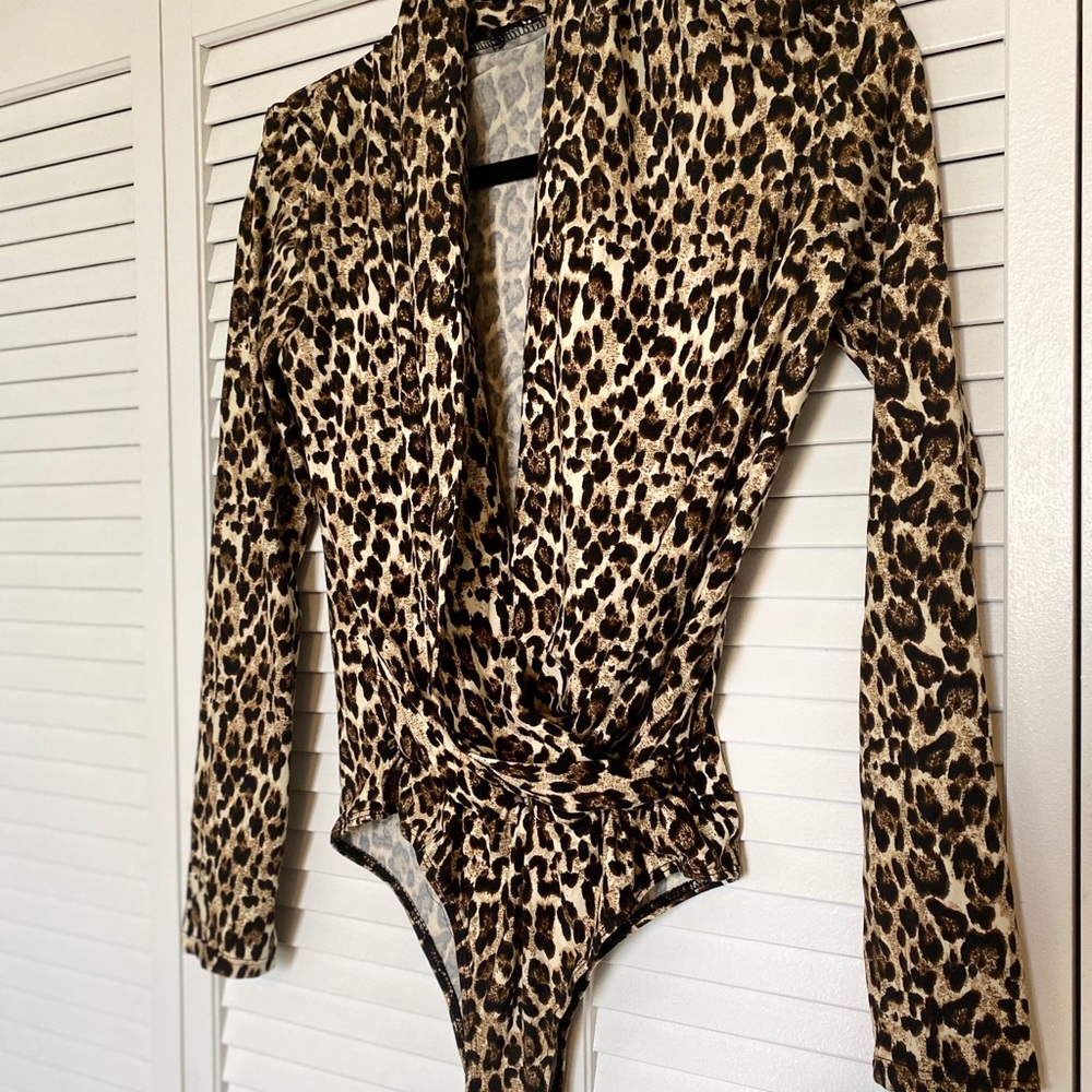 Cheetah print long sleeve body suit!
